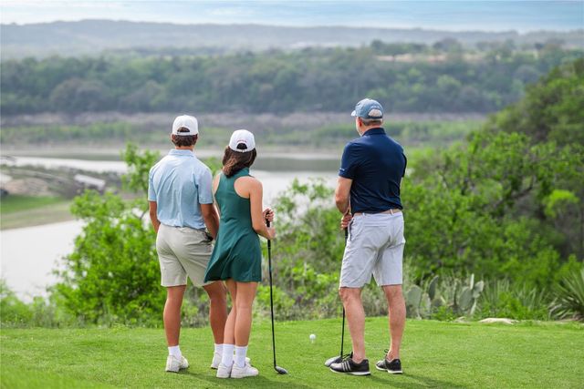 a patio with yard table and chairs