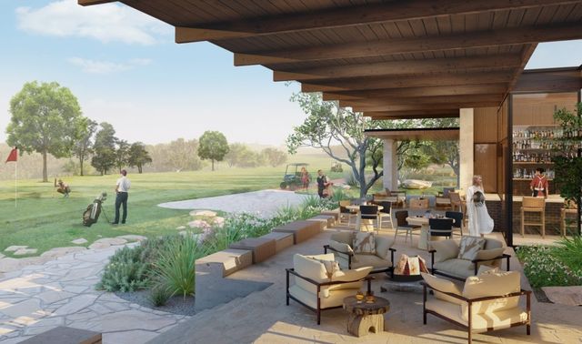 a view of a garden with an ocean view