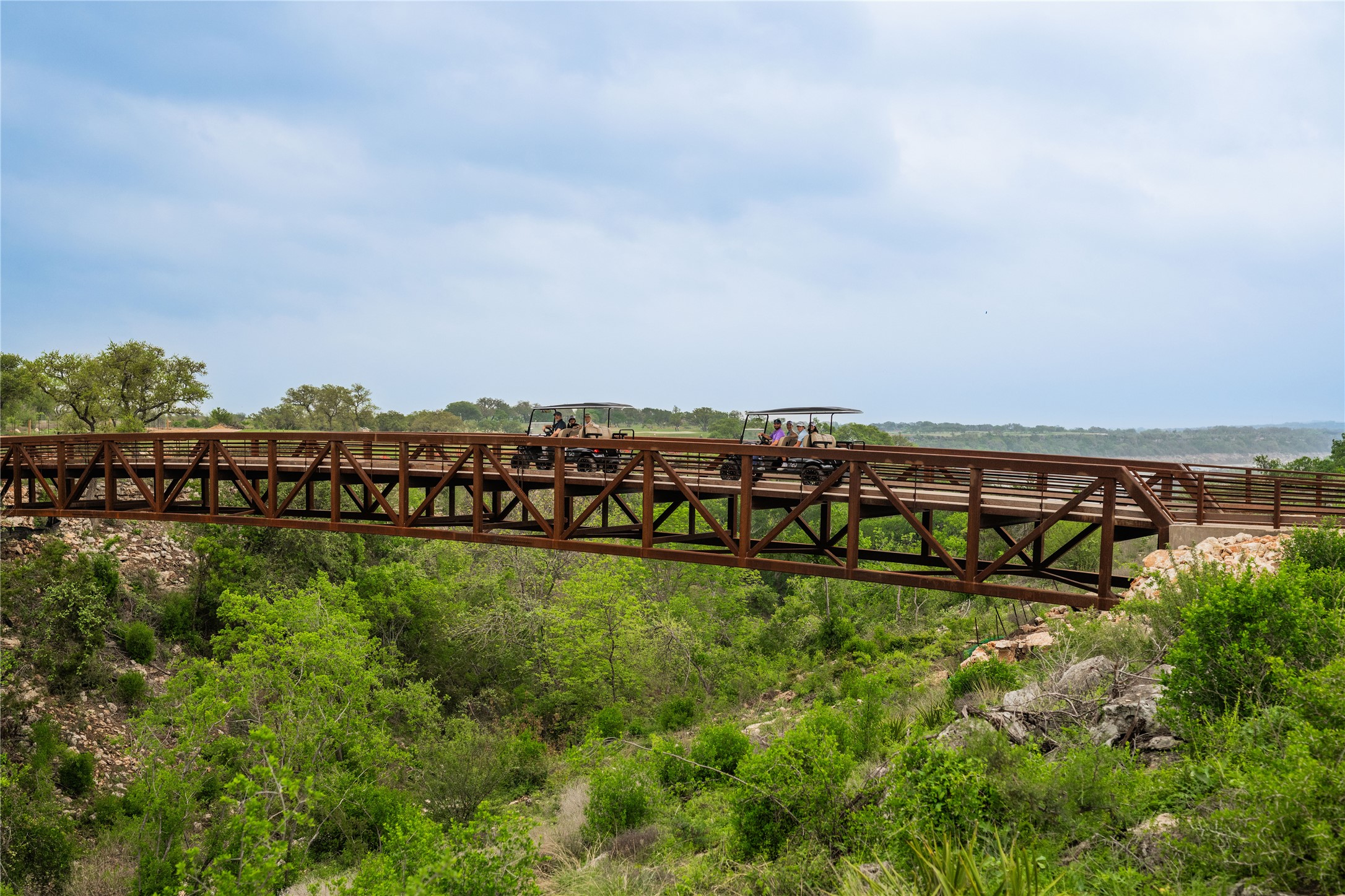 _ Pleasant Knoll Drive Road Spicewood, TX 78669 - Photo 10 of 23 a view of a garden with an ocean view