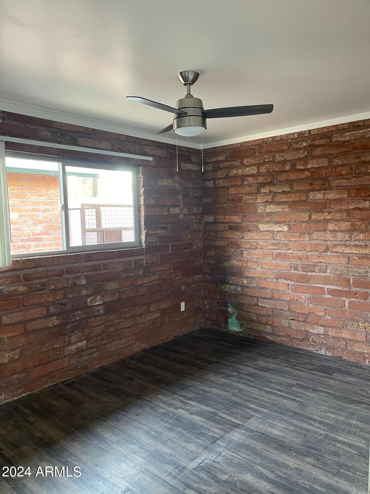 1006 South Dorsey Lane, Unit 16 Tempe, AZ 85281 - Photo 10 of 10 a view of a room with an empty space and a window