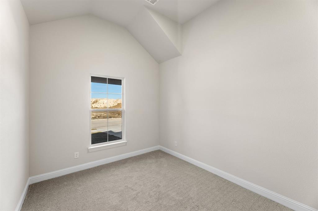 4802 Timberdrift Street Midlothian, TX 76065 - Photo 12 of 34 a view of an empty room and a window