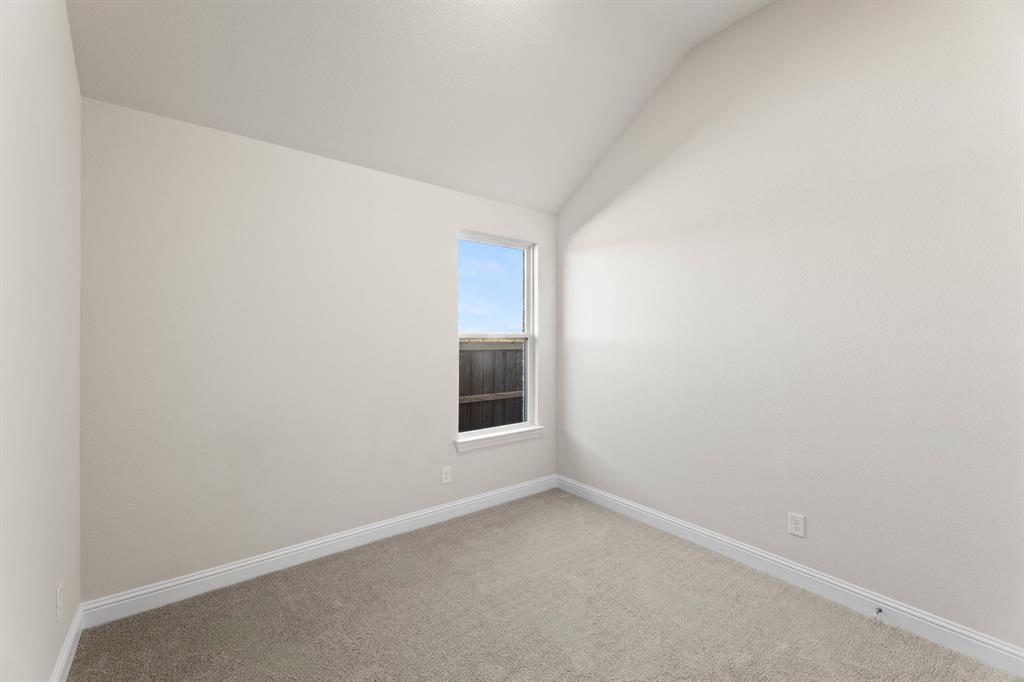 4802 Timberdrift Street Midlothian, TX 76065 - Photo 13 of 34 an empty room with a window