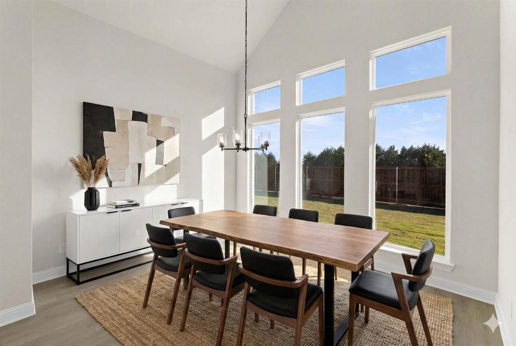 4802 Timberdrift Street Midlothian, TX 76065 - Photo 18 of 34 a view of a dining room with furniture and window