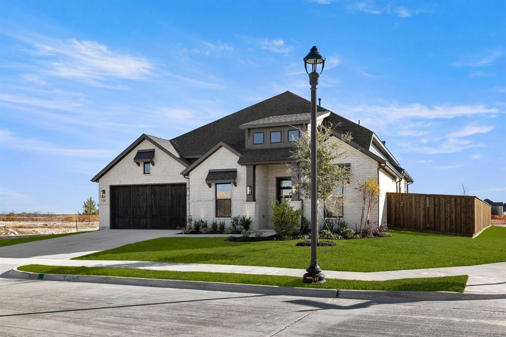 4802 Timberdrift Street Midlothian, TX 76065 - Photo 2 of 34 a front view of a house with a yard