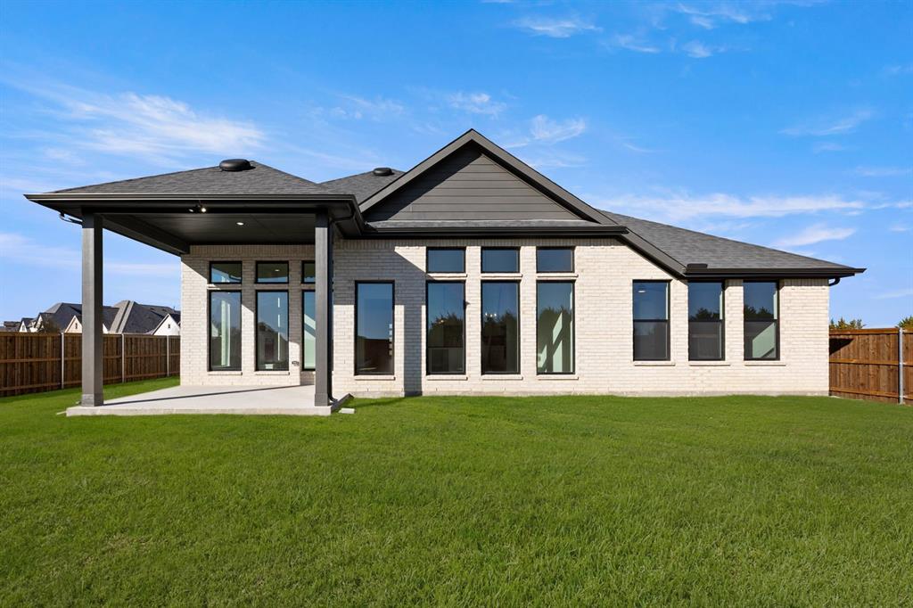 4802 Timberdrift Street Midlothian, TX 76065 - Photo 3 of 34 a front view of a house with a yard