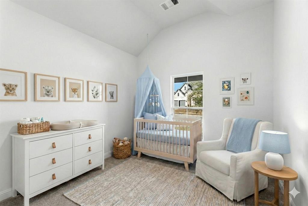4802 Timberdrift Street Midlothian, TX 76065 - Photo 8 of 34 a room with a baby crib and a couch