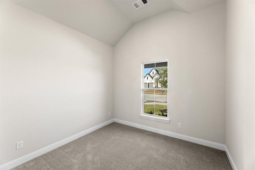 4802 Timberdrift Street Midlothian, TX 76065 - Photo 9 of 34 an empty room with a window