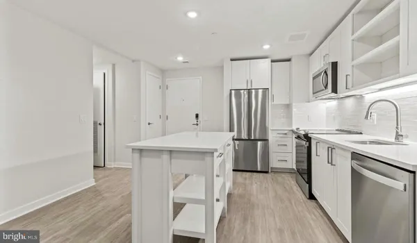 wooden floor and window in an empty room