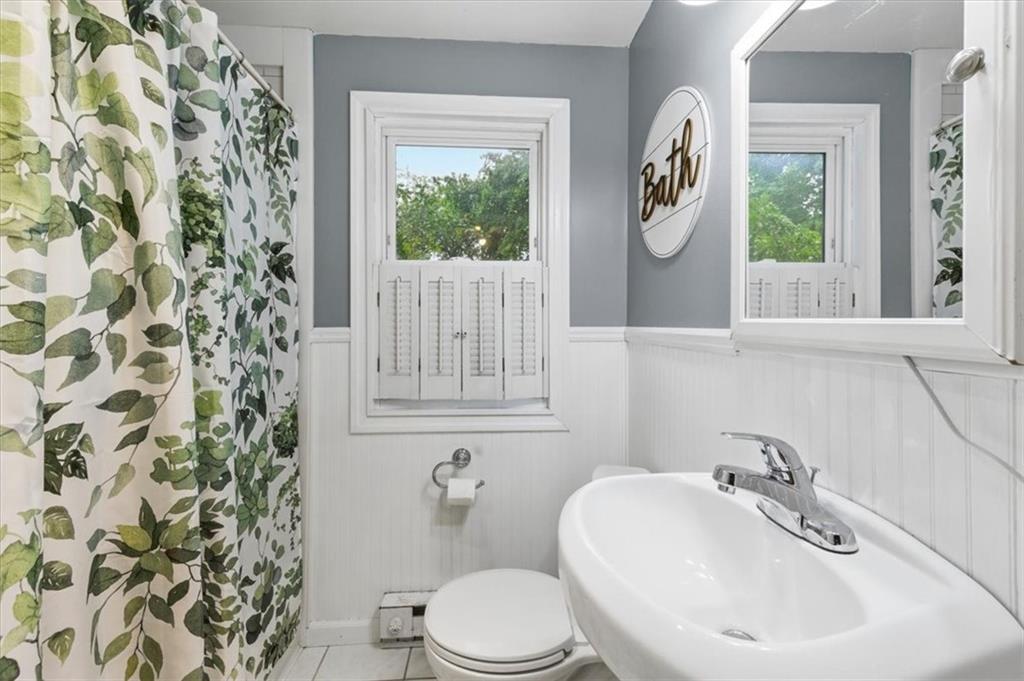 344 Winfield Road Cabot, PA 16023 - Photo 15 of 30 a bathroom with a sink a toilet and a mirror