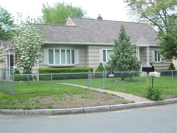 68 Patterson Avenue Springfield, MA 01119 - Photo 1 of 24 a view of a house with a yard and a garden