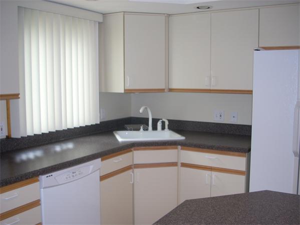 68 Patterson Avenue Springfield, MA 01119 - Photo 11 of 24 a kitchen with granite countertop white cabinets and a sink
