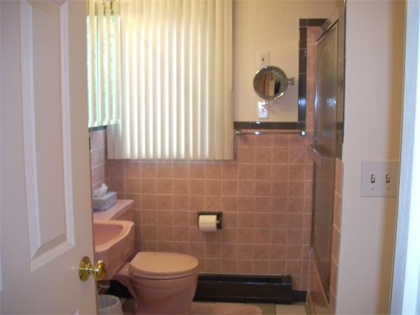 68 Patterson Avenue Springfield, MA 01119 - Photo 16 of 24 a bathroom with a toilet and a shower