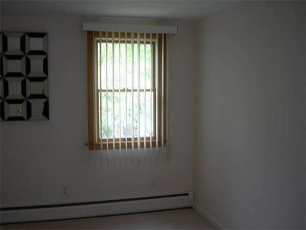 68 Patterson Avenue Springfield, MA 01119 - Photo 17 of 24 a view of a room that has a window in it