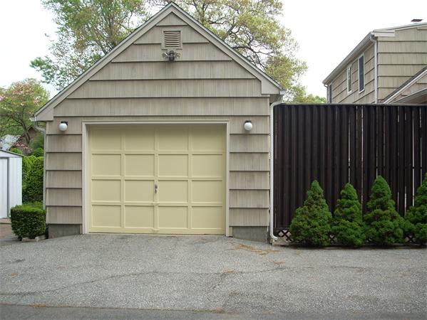 68 Patterson Avenue Springfield, MA 01119 - Photo 2 of 24 a front view of a house with a yard