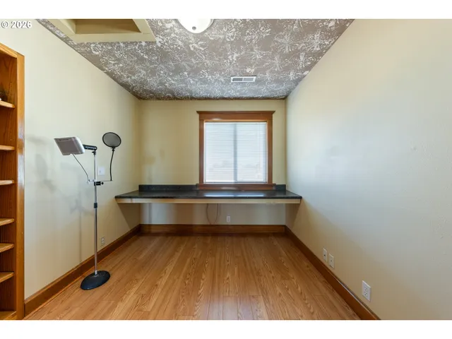 a picture of a bathroom with a shower