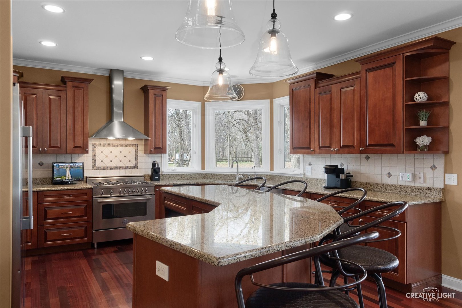 2086 Bilter Road Aurora, IL 60502 - Photo 14 of 59 a kitchen with granite countertop a sink stove and cabinets