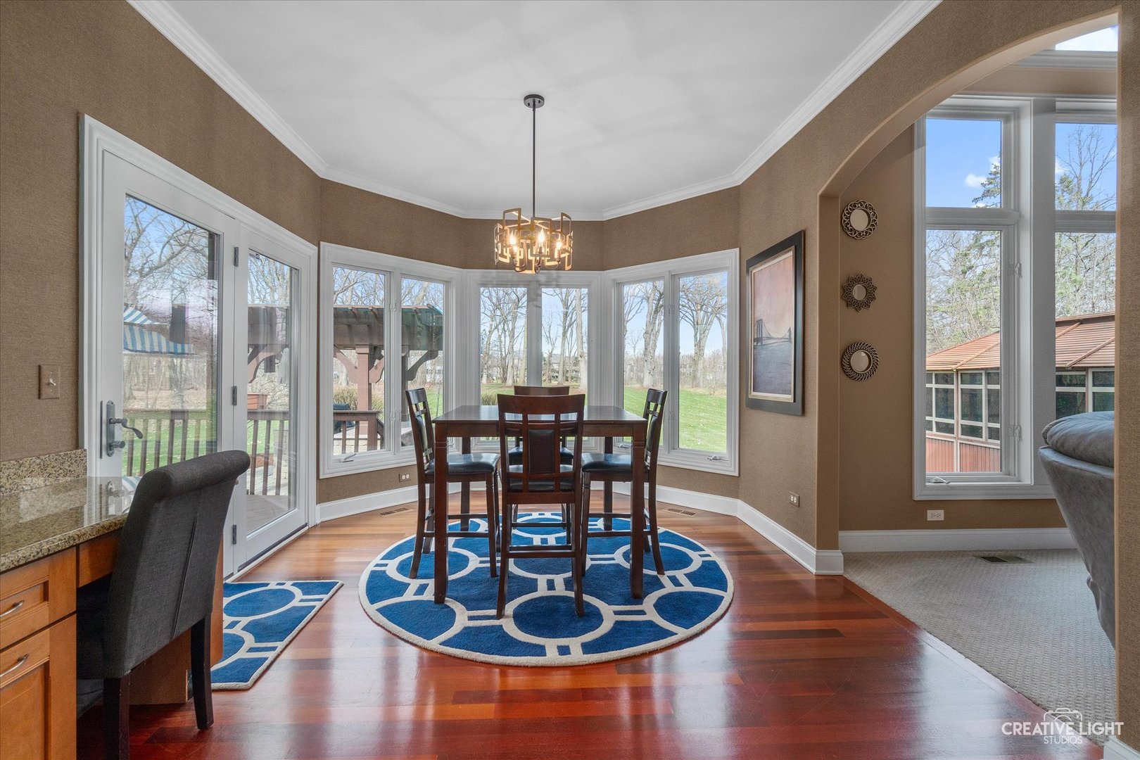 2086 Bilter Road Aurora, IL 60502 - Photo 18 of 59 a view of a dining room with furniture window and wooden floor