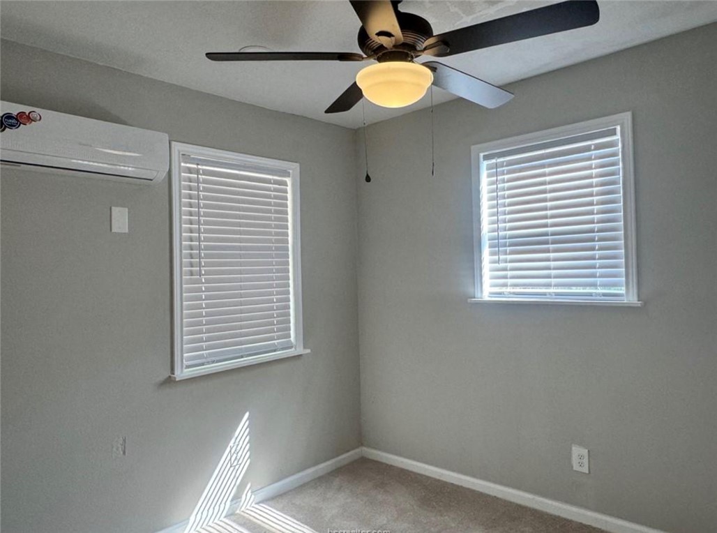 4603 Castle Avenue Bryan, TX 77808 - Photo 6 of 8 a view of an empty room with a window