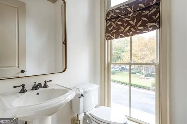 a bathroom with a sink and a toilet