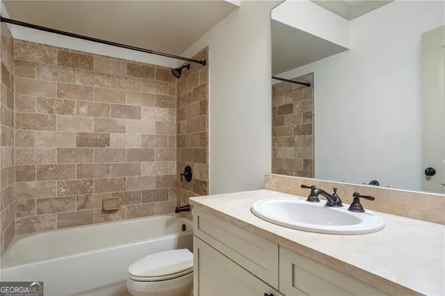 a view of a backyard of the house