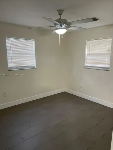 en empty room with a window