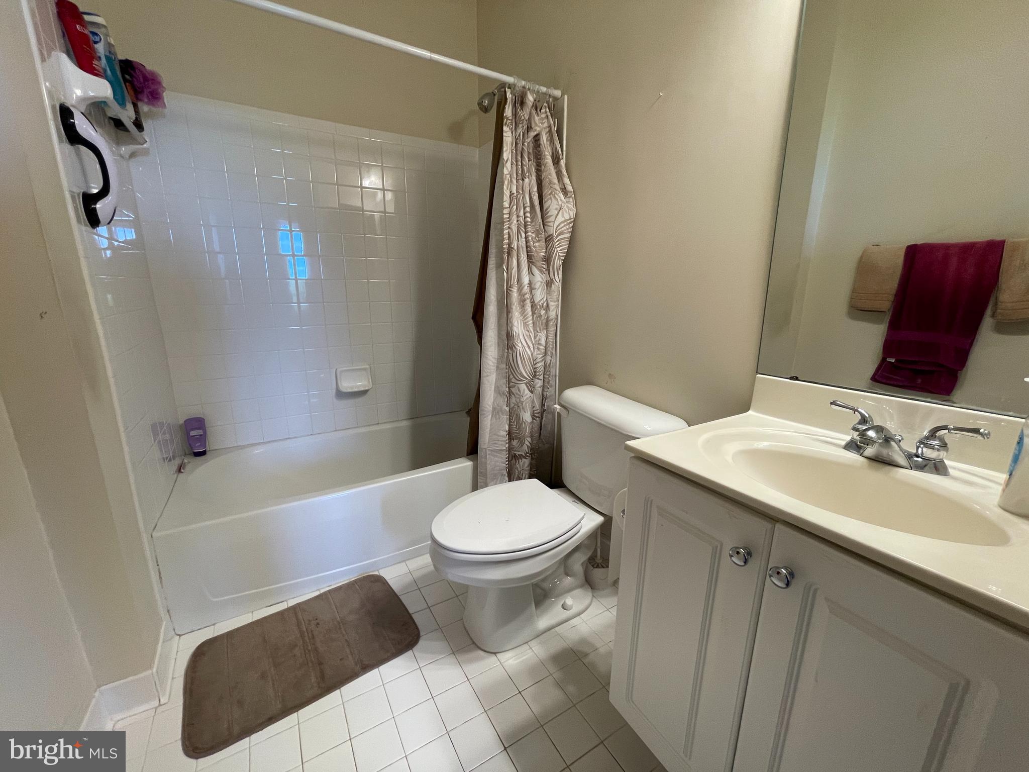 2250 Bear Den Road, Unit 308 Frederick, MD 21701 - Photo 31 of 71 a bathroom with a sink toilet and shower
