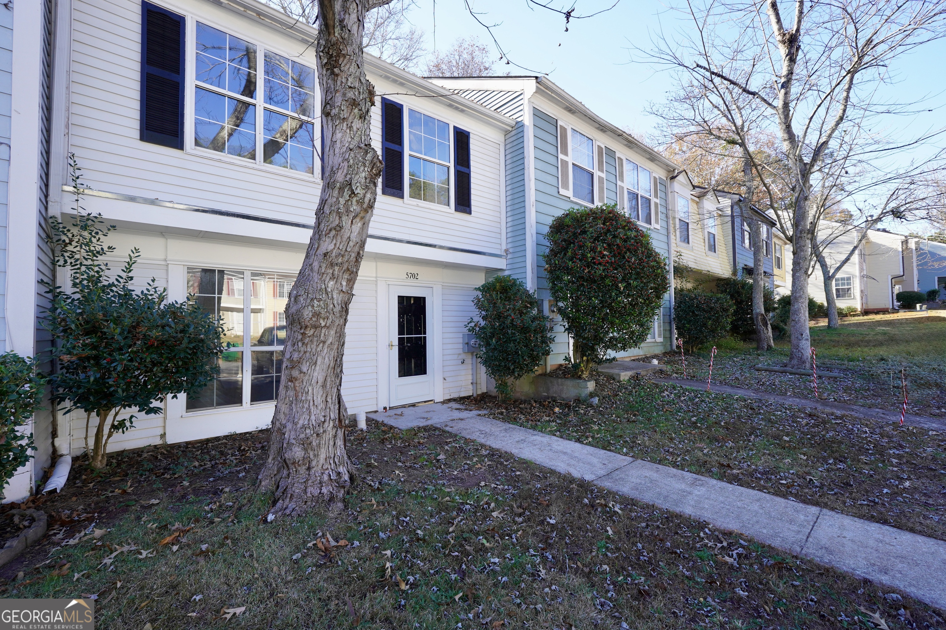 5702 Wells Circle Stone Mountain, GA 30087 - Photo 2 of 29 a view of a front of a house with a yard