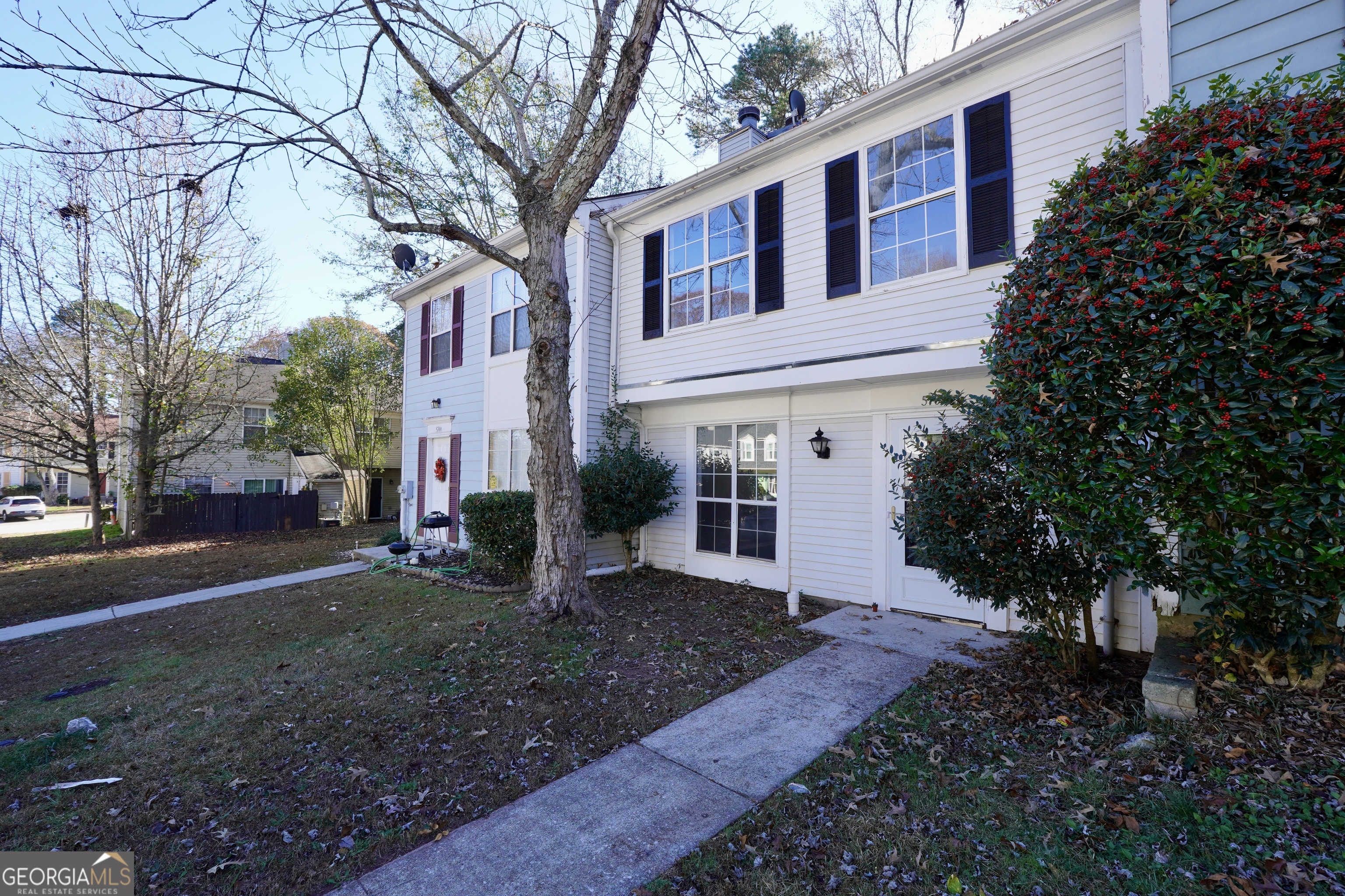 5702 Wells Circle Stone Mountain, GA 30087 - Photo 29 of 29 a view of a house with a yard