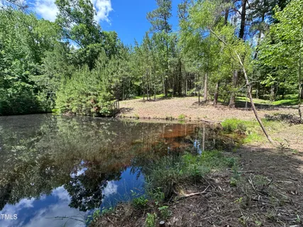 a view of a backyard of the house
