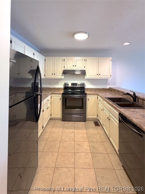 492 Lands End Road Fayetteville, NC 28314 - Photo 11 of 39 a kitchen with stainless steel appliances granite countertop a stove a sink and a refrigerator