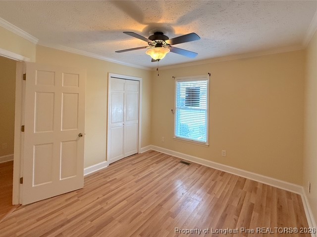 492 Lands End Road Fayetteville, NC 28314 - Photo 15 of 39 wooden floor in an empty room with a window