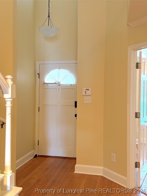 492 Lands End Road Fayetteville, NC 28314 - Photo 25 of 39 an empty room with wooden floor and entrance