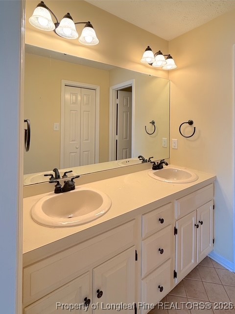 492 Lands End Road Fayetteville, NC 28314 - Photo 32 of 39 a bathroom with a double vanity sink mirror and