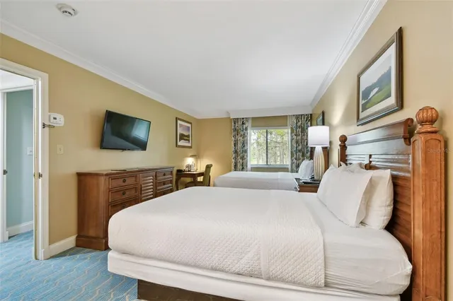 a bathroom with a granite countertop tub sink and mirror