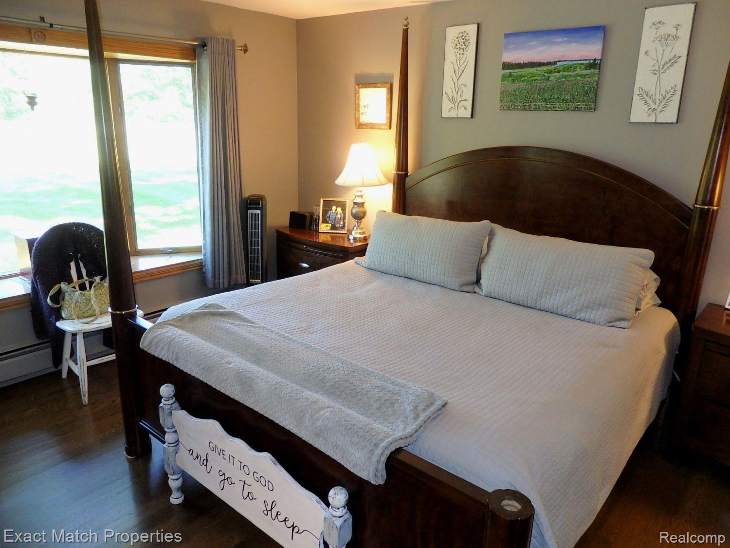 2980 East Rose Center Road Highland, MI 48356 - Photo 38 of 72 First floor master bedroom suite