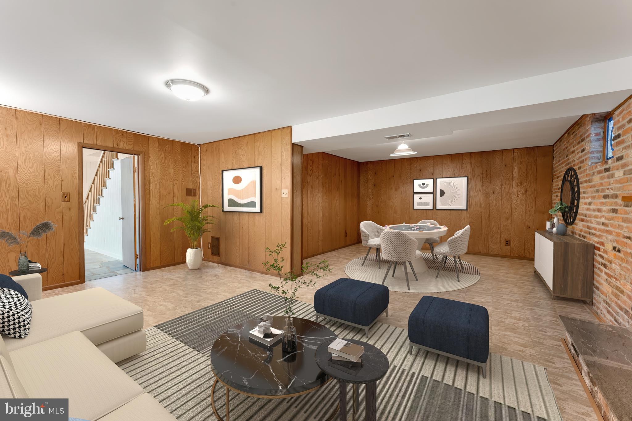 3904 Foreston Road Beltsville, MD 20705 - Photo 19 of 33 1st floor media/rec room w/ wood burning fireplace