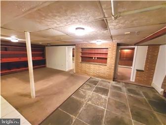 802 13th Street, Unit B New Castle, DE 19720 - Photo 7 of 17 a view of a hallway with wooden floor