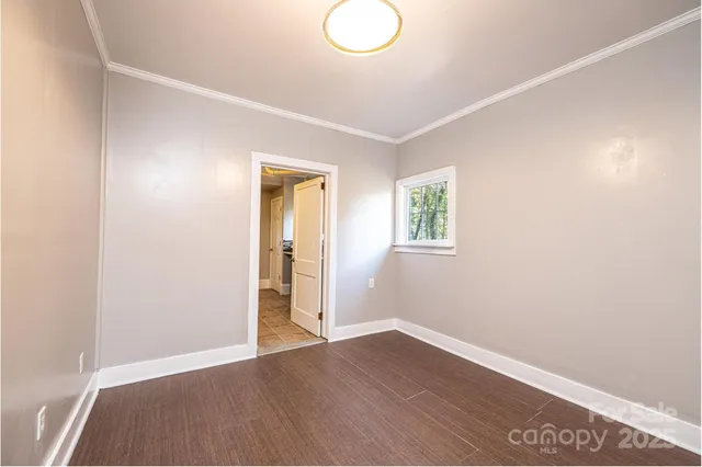 a bathroom with a toilet sink and shower
