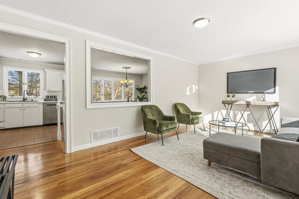 500 Franklin Street Wrentham, MA 02093 - Photo 11 of 34 a living room with furniture and a flat screen tv