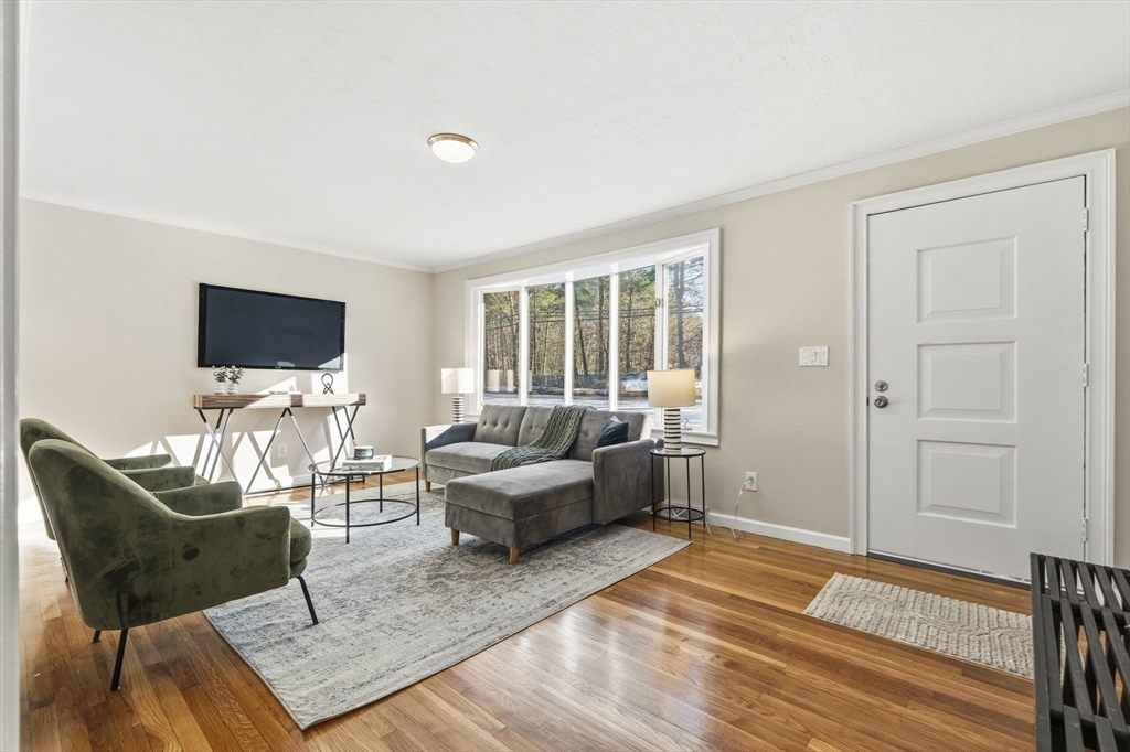 500 Franklin Street Wrentham, MA 02093 - Photo 14 of 34 a living room with furniture and a flat screen tv