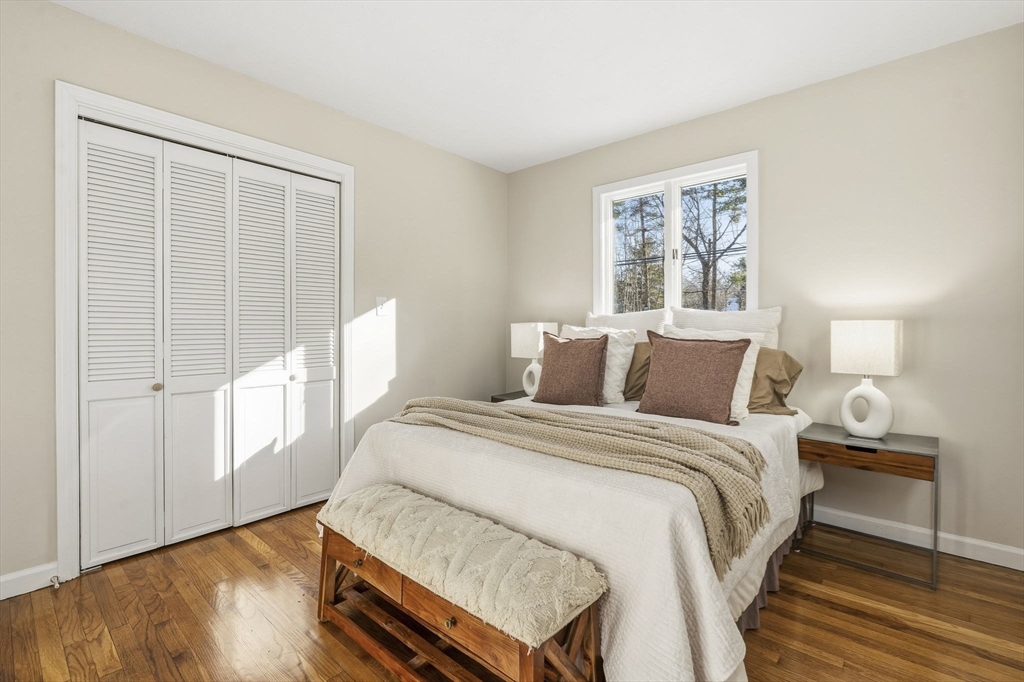 500 Franklin Street Wrentham, MA 02093 - Photo 15 of 34 a bedroom with a large bed and a window