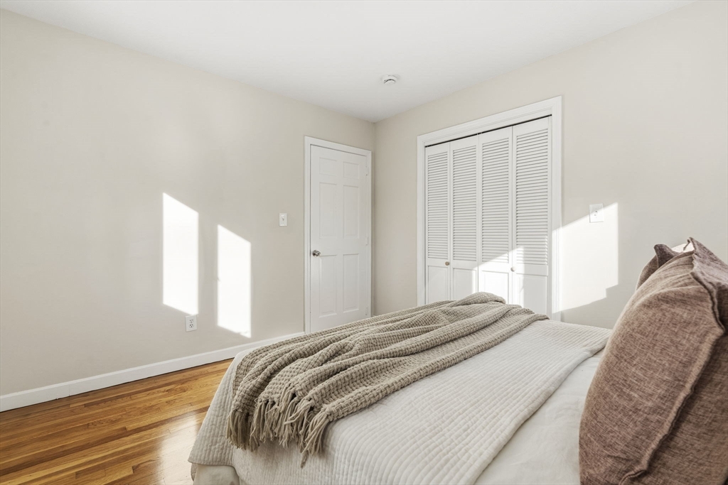 500 Franklin Street Wrentham, MA 02093 - Photo 16 of 34 a bedroom with a bed and a window