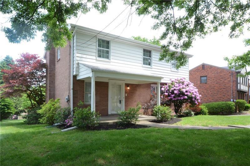 128 Herbst Road Coraopolis, PA 15108 - Photo 1 of 24 a front view of a house with garden and trees