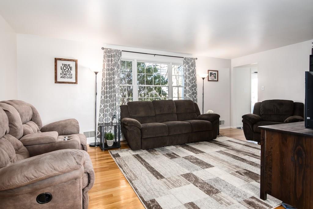 128 Herbst Road Coraopolis, PA 15108 - Photo 2 of 24 a living room with furniture and a large window