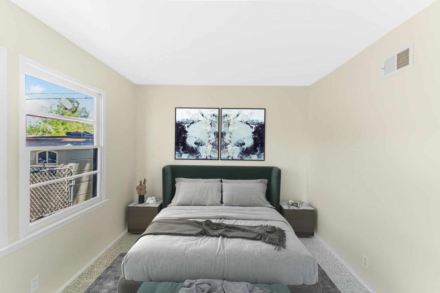 44446 Loneoak Avenue Lancaster, CA 93534 - Photo 12 of 20 a bedroom with a bed and a painting on the wall