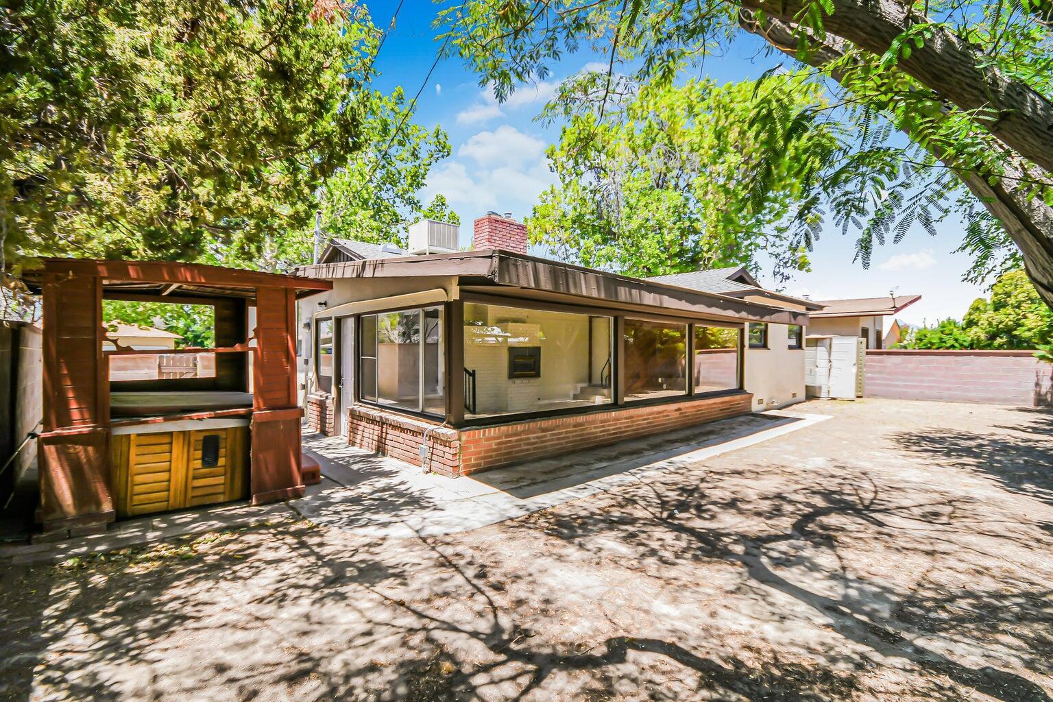 44446 Loneoak Avenue Lancaster, CA 93534 - Photo 18 of 20 a house with trees in the background