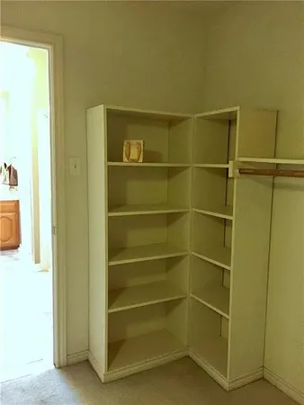 a room with walk in closet