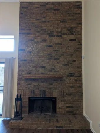 a living room with a fireplace