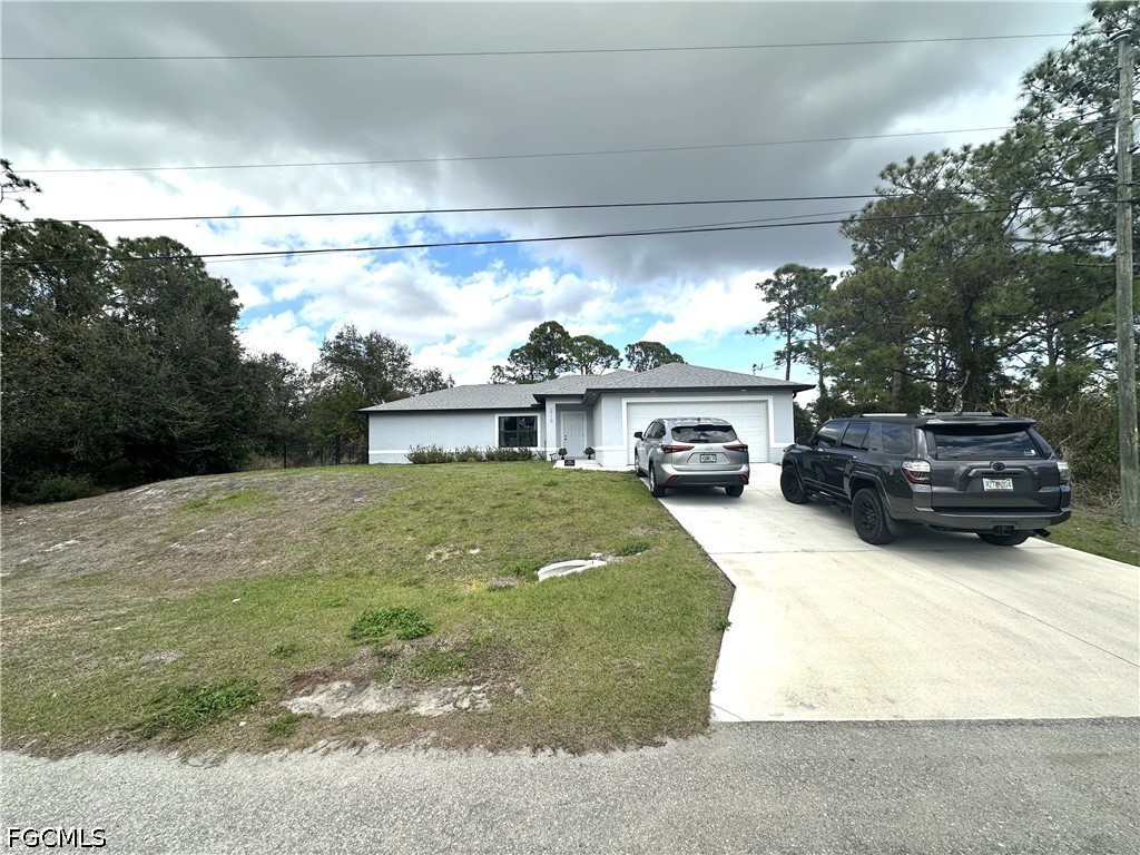 3710 38th Street Southwest Lehigh Acres, FL 33976 - Photo 1 of 36