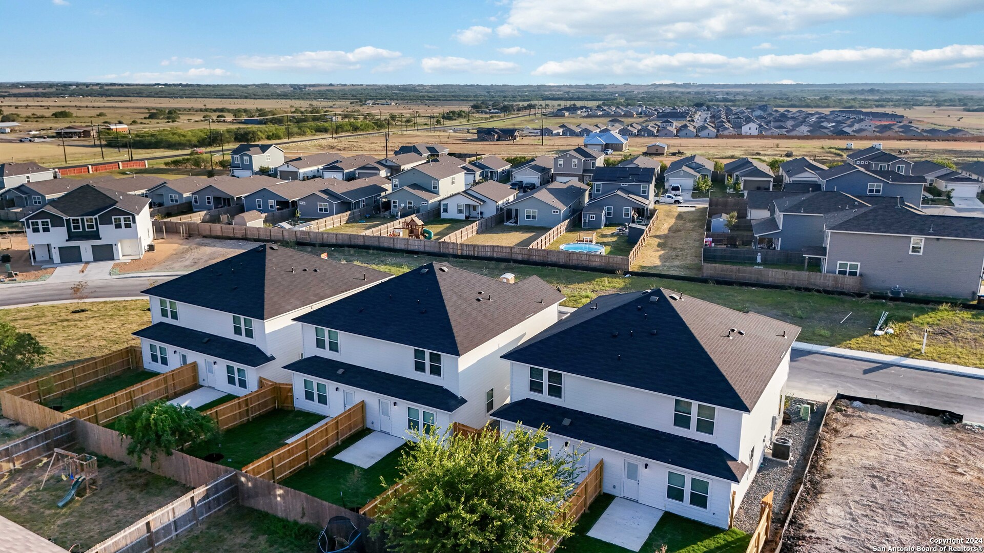3928 Abbott Pass St. Hedwig, TX 78152 - Photo 45 of 45 an aerial view of residential houses with outdoor space